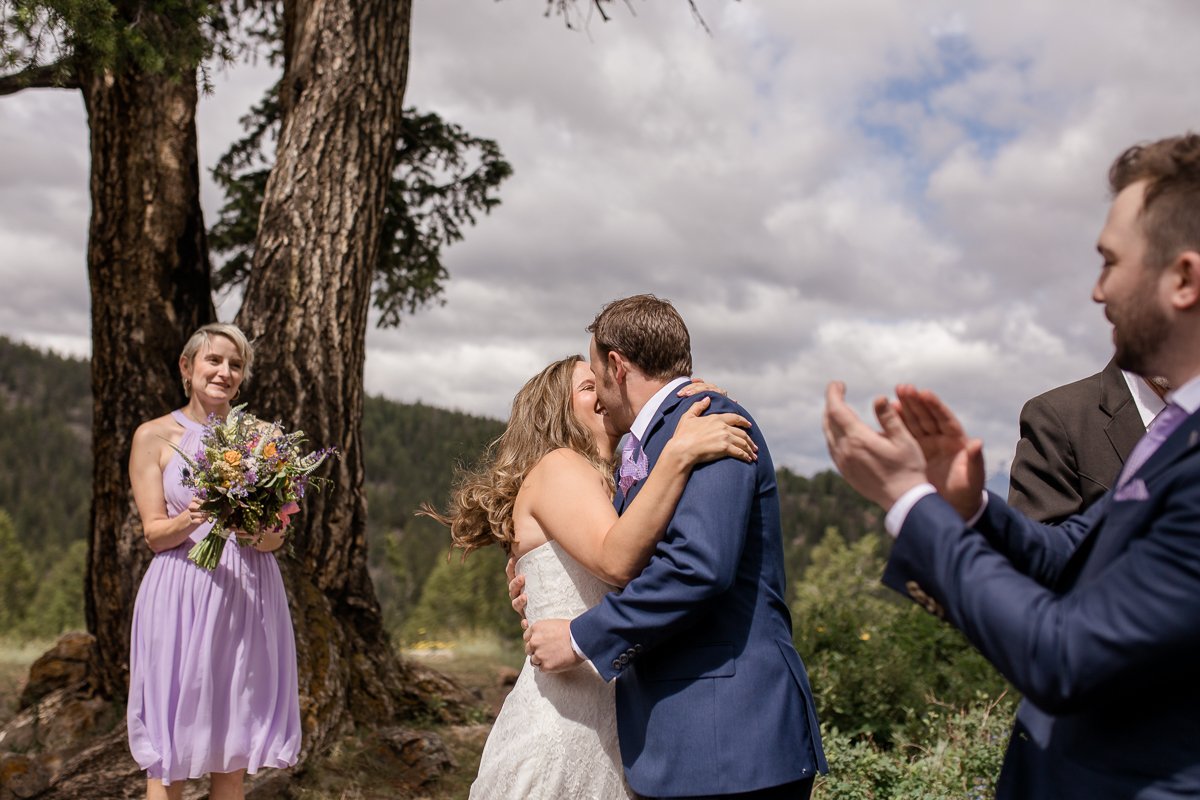 Noel and Dirk's Jackson Hole wedding with ceremony at the Wedding Tree in Bridger Teton National Forest and reception at the Bentwood Inn in Wilson, Wyoming. Photography by wyoming wedding photographer, Megan Lee Photography.