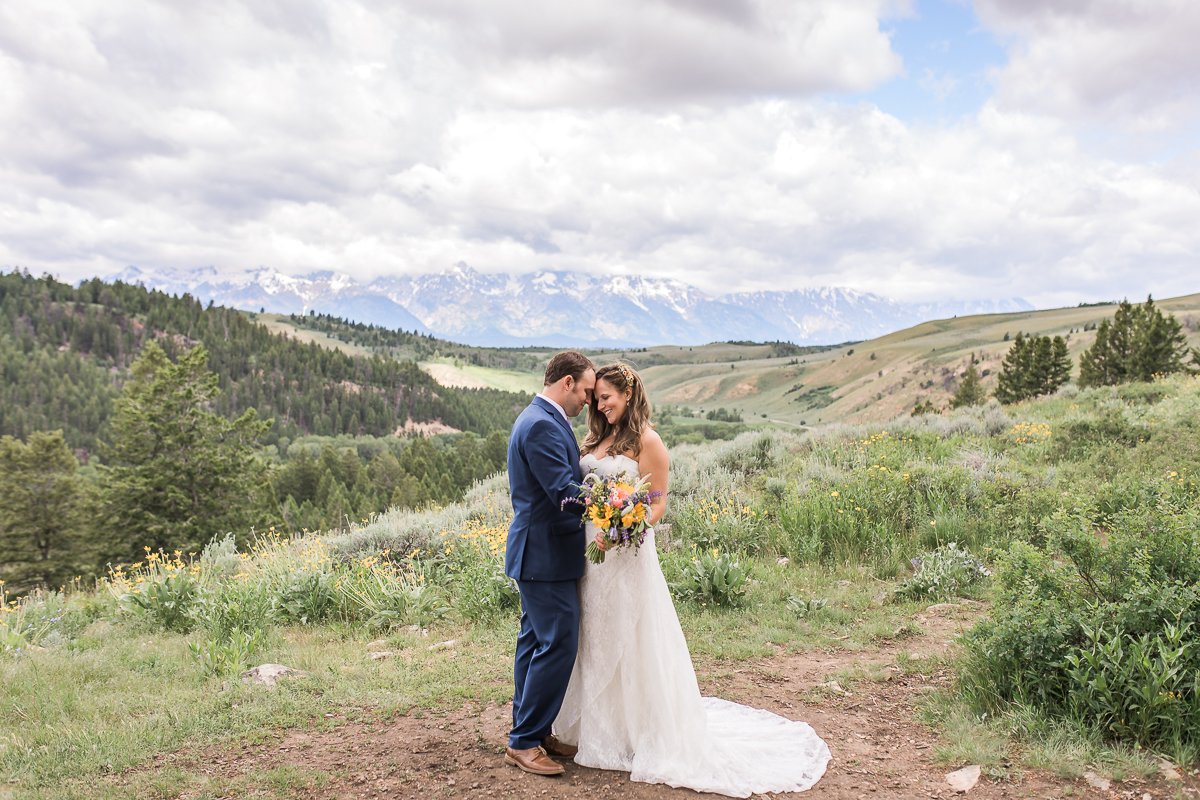 Noel and Dirk's Jackson Hole wedding with ceremony at the Wedding Tree in Bridger Teton National Forest and reception at the Bentwood Inn in Wilson, Wyoming. Photography by wyoming wedding photographer, Megan Lee Photography.