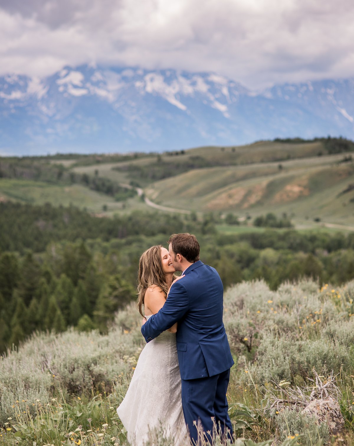 Noel and Dirk's Jackson Hole wedding with ceremony at the Wedding Tree in Bridger Teton National Forest and reception at the Bentwood Inn in Wilson, Wyoming. Photography by wyoming wedding photographer, Megan Lee Photography.