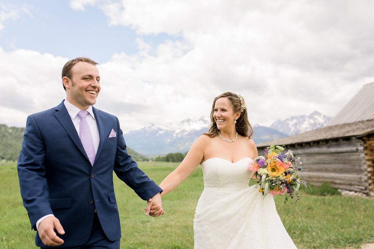 Noel and Dirk's Jackson Hole wedding with ceremony at the Wedding Tree in Bridger Teton National Forest and reception at the Bentwood Inn in Wilson, Wyoming. Photography by wyoming wedding photographer, Megan Lee Photography.