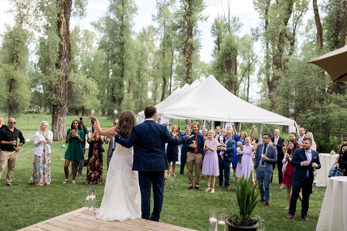 Noel and Dirk's Jackson Hole wedding with ceremony at the Wedding Tree in Bridger Teton National Forest and reception at the Bentwood Inn in Wilson, Wyoming. Photography by wyoming wedding photographer, Megan Lee Photography.