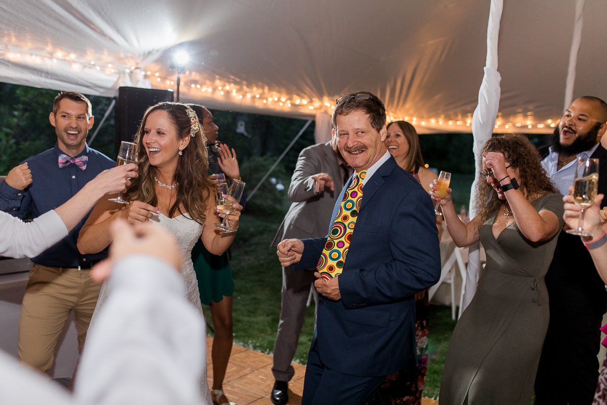 Noel and Dirk's Jackson Hole wedding with ceremony at the Wedding Tree in Bridger Teton National Forest and reception at the Bentwood Inn in Wilson, Wyoming. Photography by wyoming wedding photographer, Megan Lee Photography.