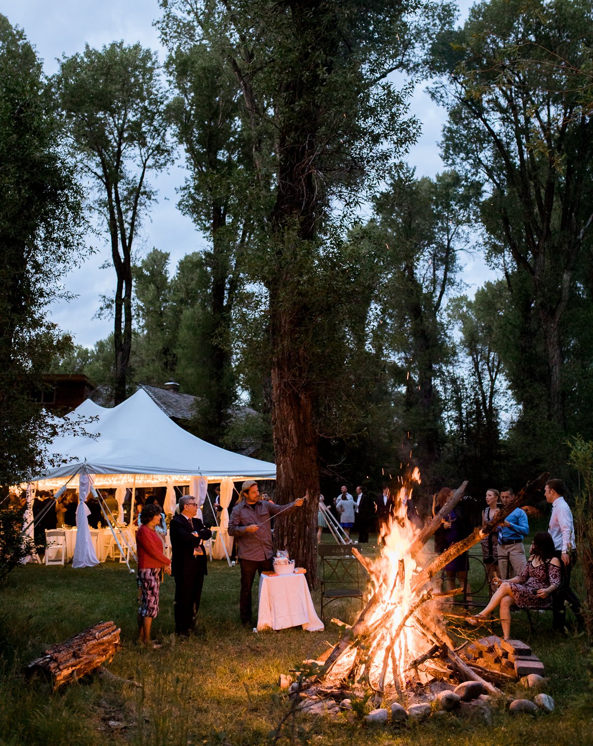 Noel and Dirk's Jackson Hole wedding with ceremony at the Wedding Tree in Bridger Teton National Forest and reception at the Bentwood Inn in Wilson, Wyoming. Photography by wyoming wedding photographer, Megan Lee Photography.